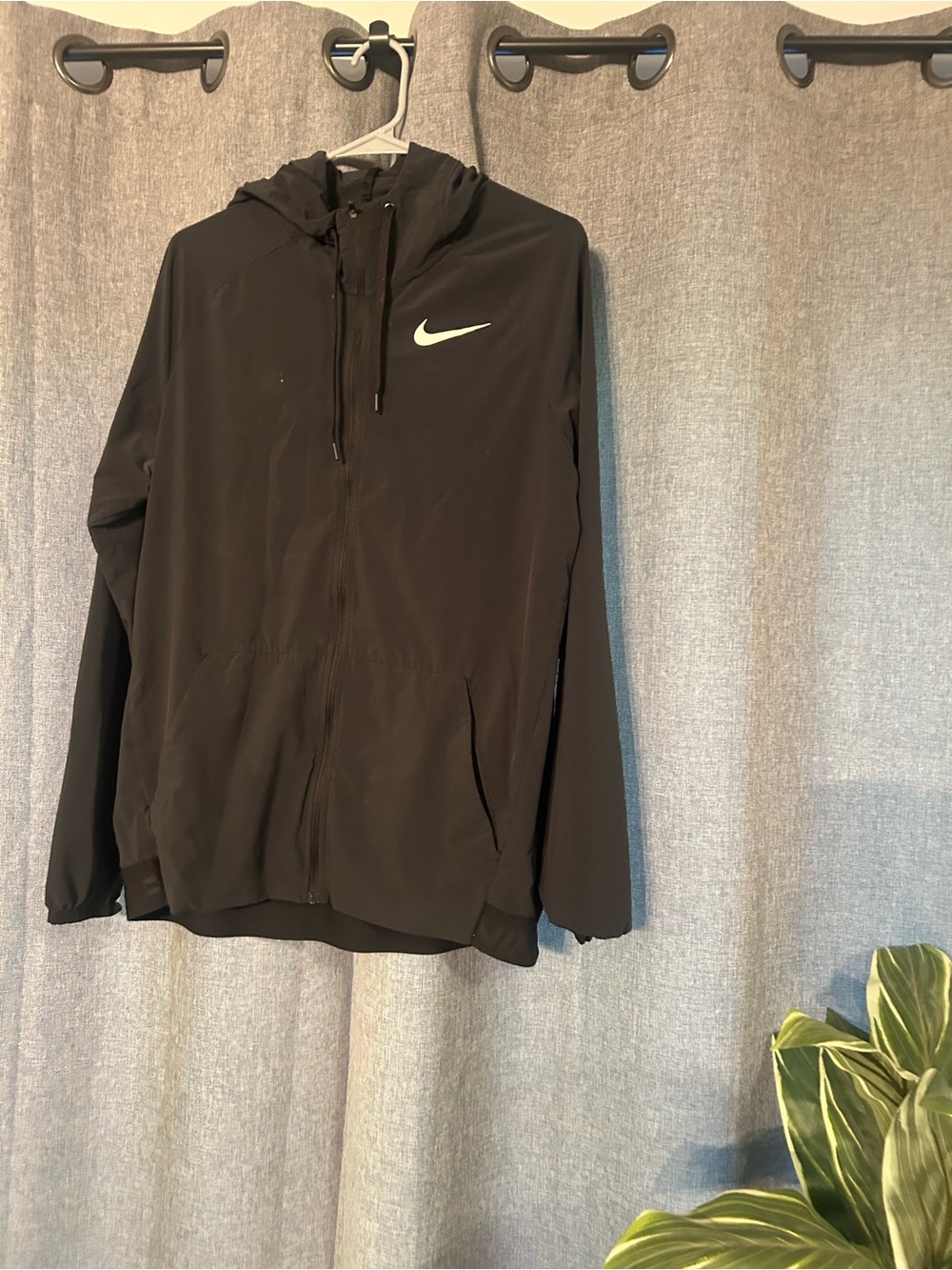 Nike Black Women's Windbreaker Jacket with White Swoosh